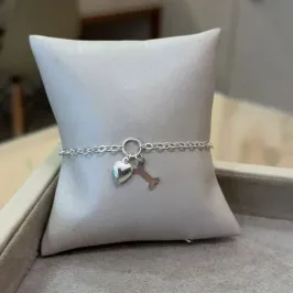 PULSEIRA PRATA CORAÇÃO E OSSINHO