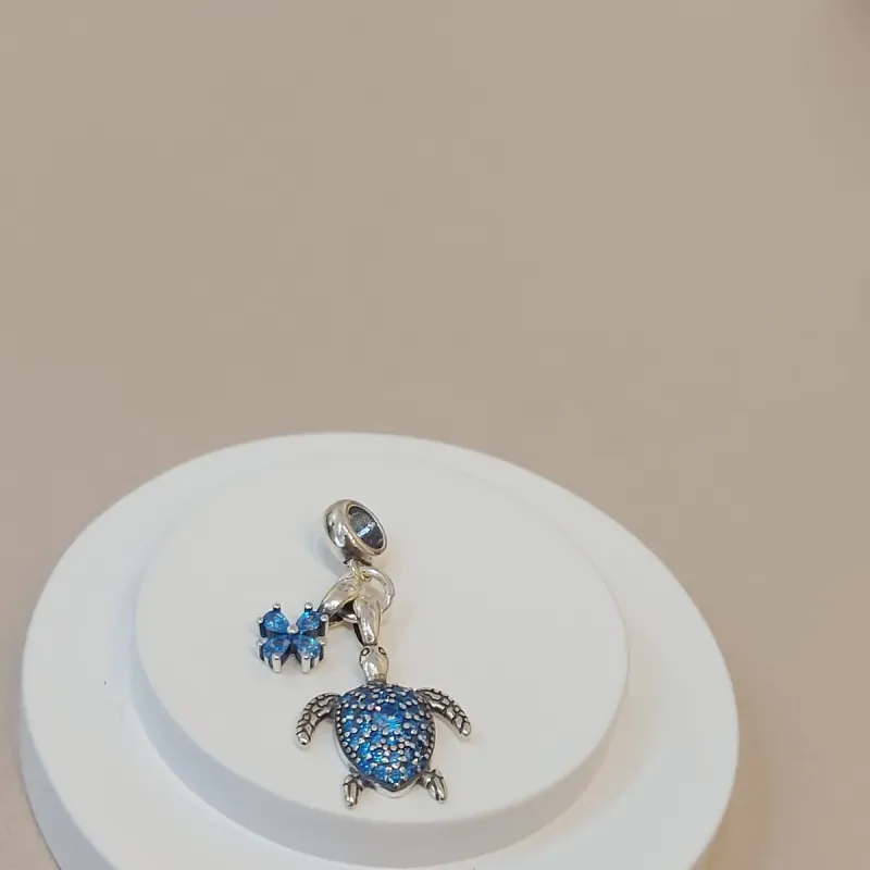 BERLOQUE PRATA TARTARUGA AZUL CRAVEJADA