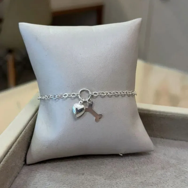 PULSEIRA PRATA CORAÇÃO E OSSINHO