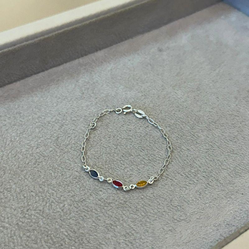 PULSEIRA PRATA INFANTIL ZIRCÔNIAS AZUL, VERMELHA E AMARELA