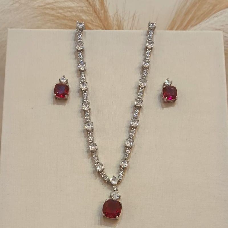 CONJUNTO ZIRCÔNIA CRISTAL E PEDRA VERMELHA