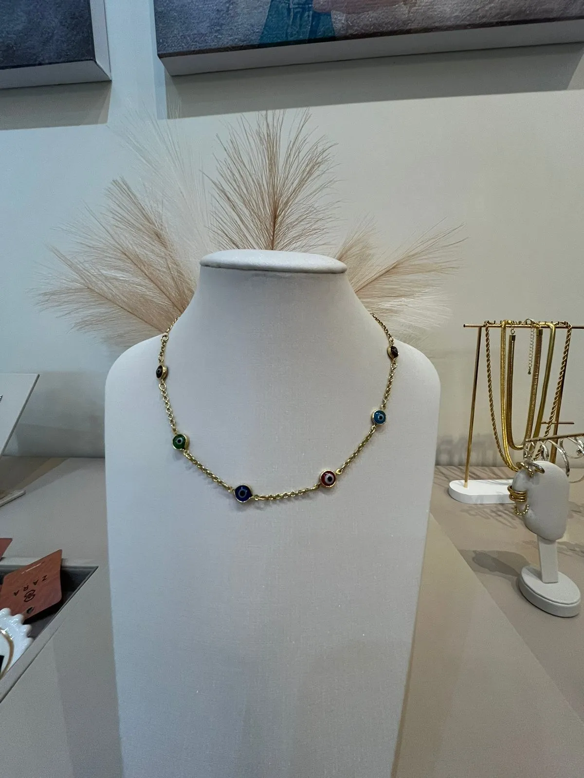 CHOKER OLHO GREGO