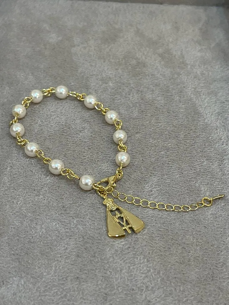 PULSEIRA PÉROLAS C/ PINGENTE N S APARECIDA