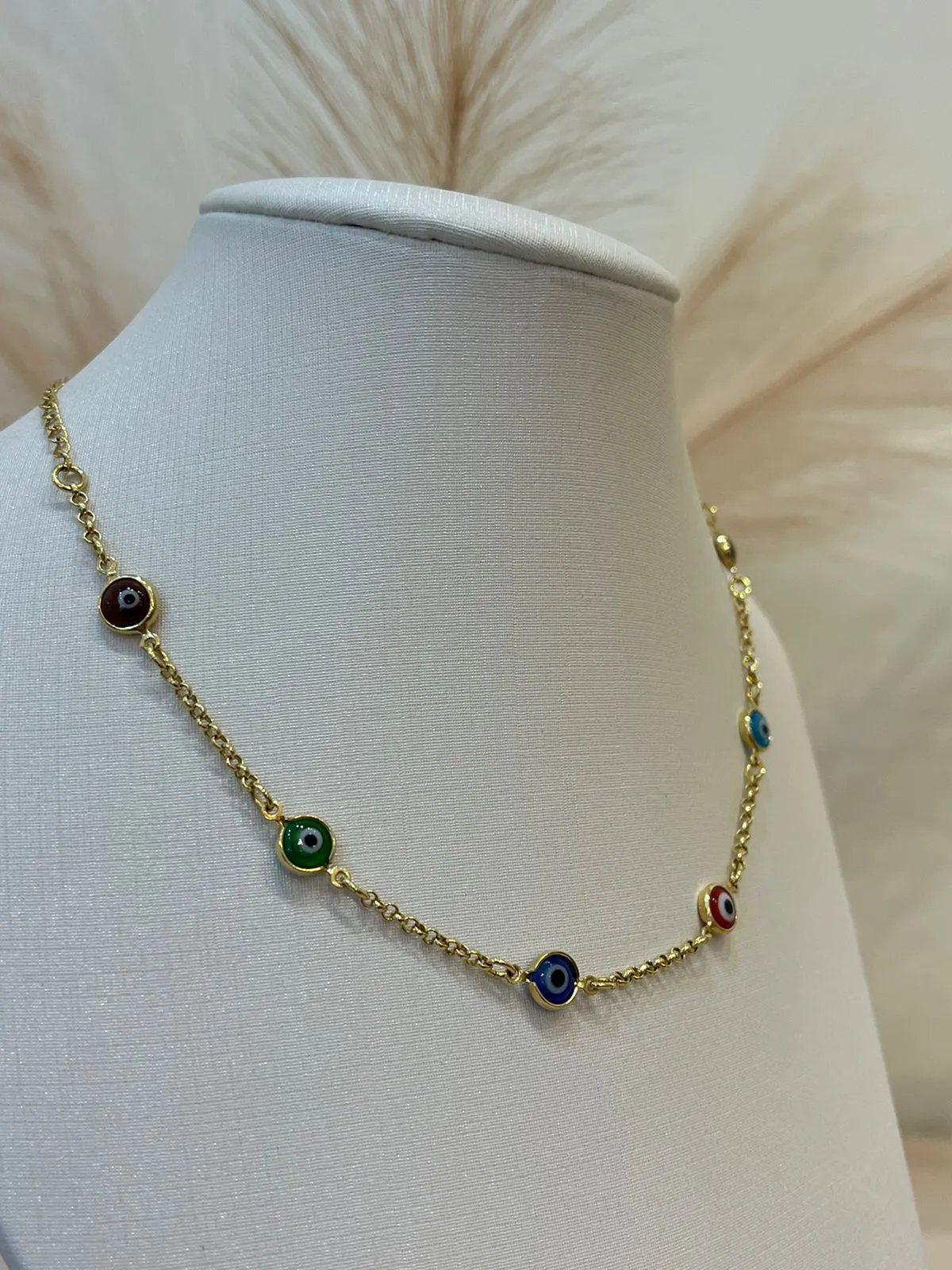 CHOKER OLHO GREGO