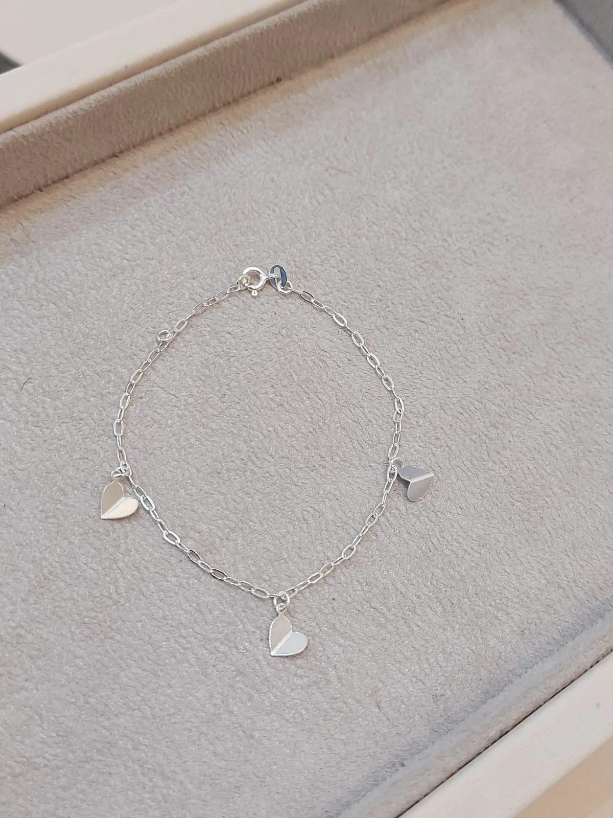 PULSEIRA PRATA ELOS E CORAÇÕES DOBRADOS