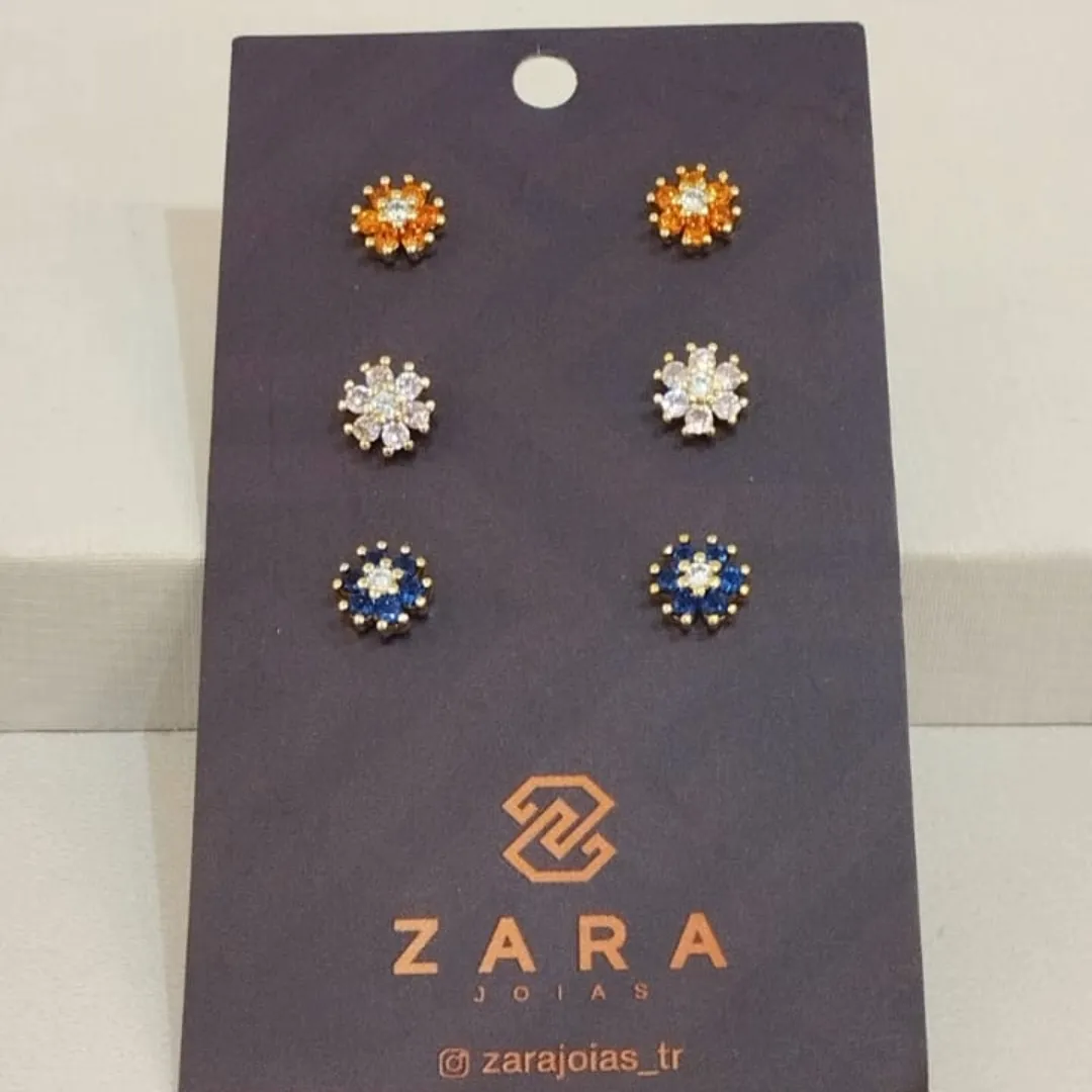 TRIO BRINCOS FLORES ZIRCONIAS (LARANJA/ROSA/AZUL)