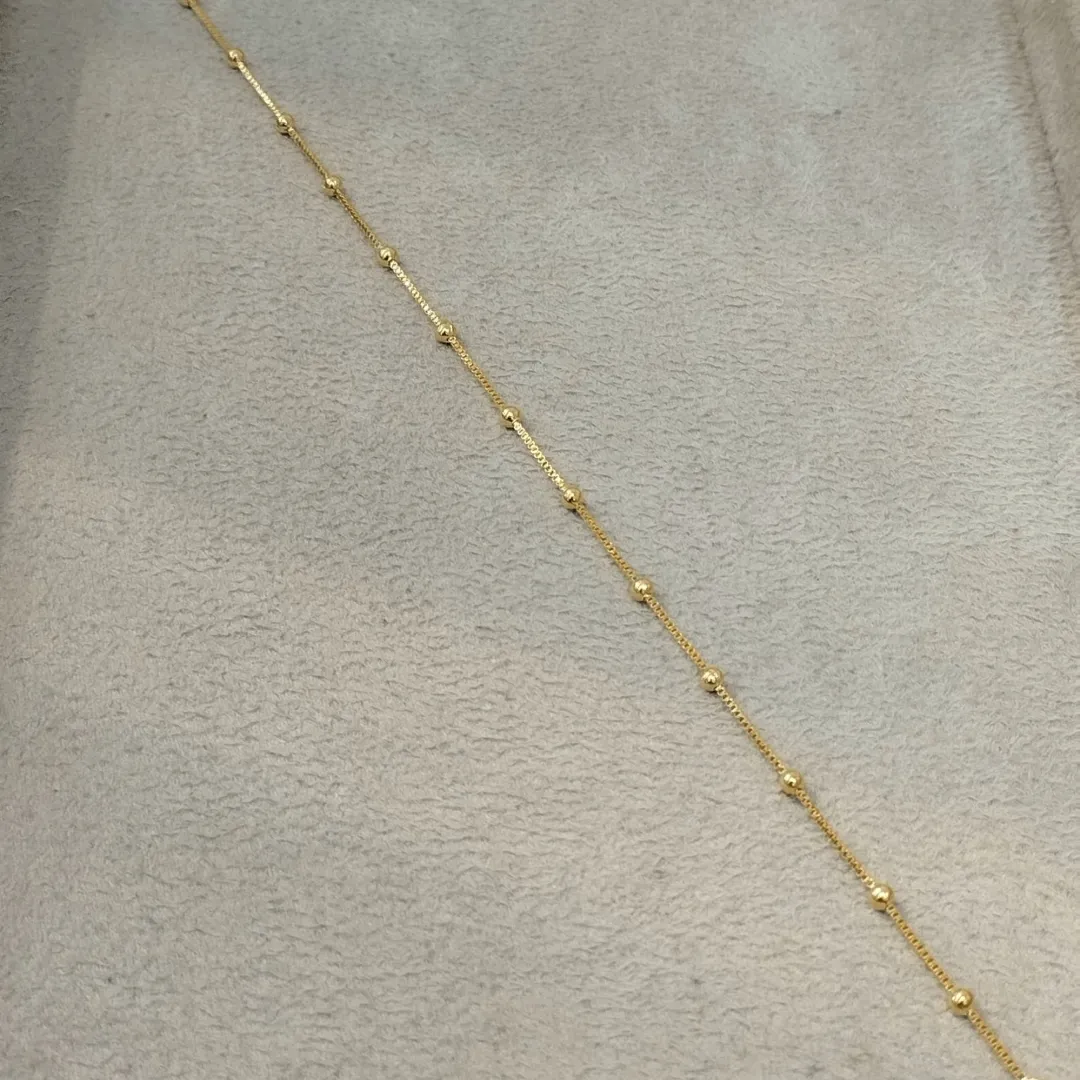 TORNOZELEIRA VENEZIANA E BOLINHAS