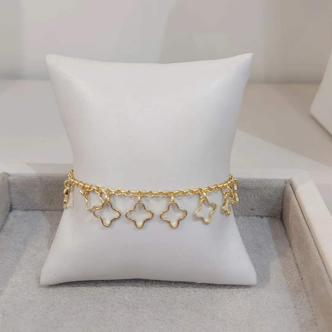 PULSEIRA PINGENTES TREVOS VAZADOS
