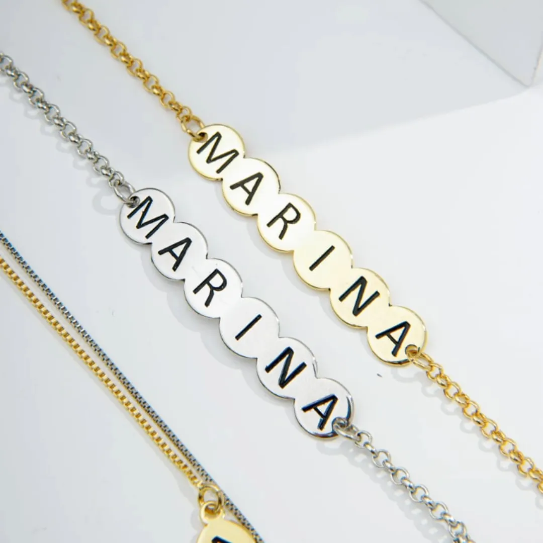 PULSEIRA BOLINHAS NOME DOURADA