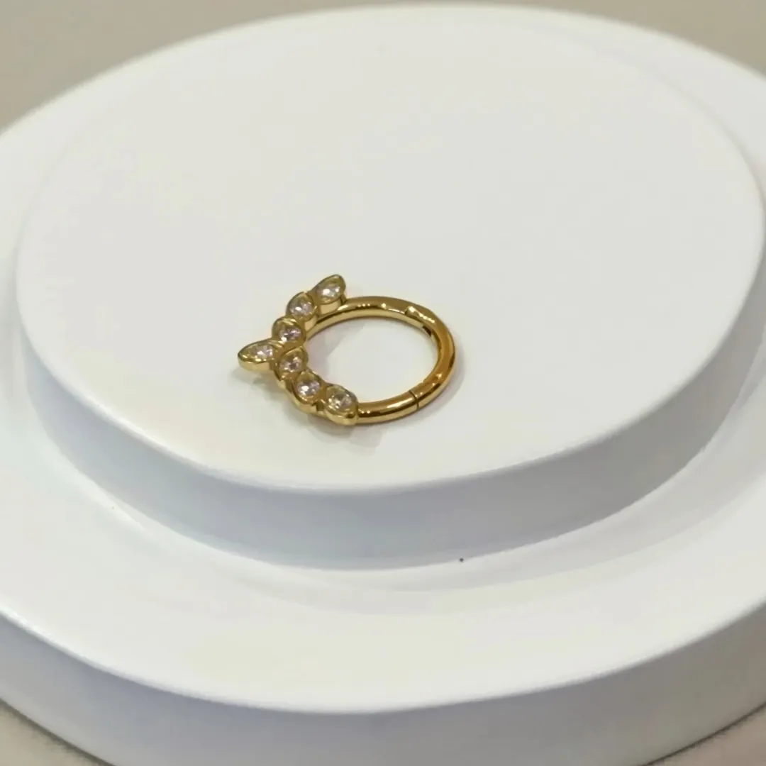 PIERECING ARGOLA SEGMENTADA 7 ZIRCÔNIAS PVD GOLD