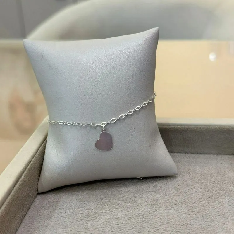 PULSEIRA PRATA ELOS E PINGENTE CORAÇÃO